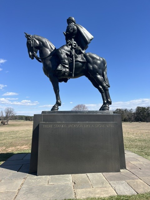 Statue of Stonewall Jackson at Henry Hill with STONE WALL carved on the base